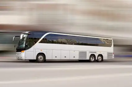 1 Dead, Several Injured in Oklahoma City Bus Crash 1 Tour bus with added motion blur