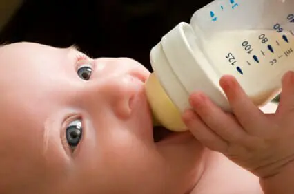 Blog 12 Baby drinking from a bottle