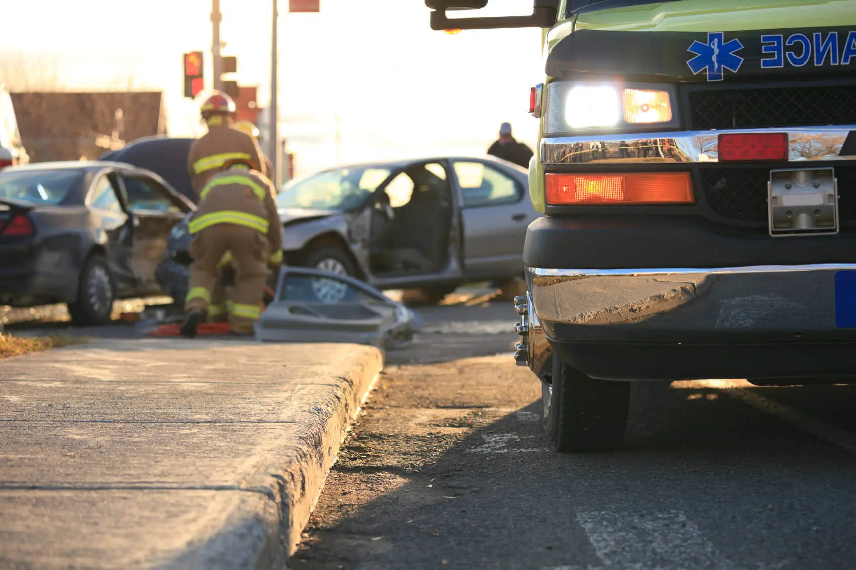 One Dead, One Injured in Weather-Related Crash in San Antonio 1 Car accident with firefighters and ambulance