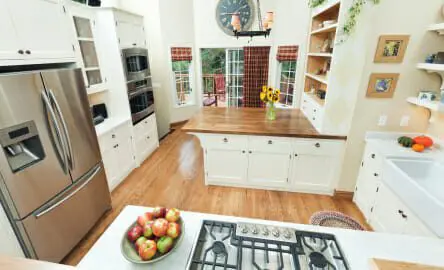 Blog 8 High angle of a contemporary classic design showcase kitchen interior with view to outdoor patio deck.