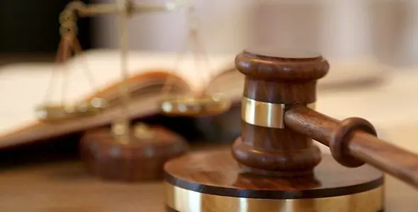 Blog 12 Blog Judge Banging a Gavel in a Courtroom