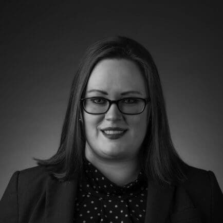 Black and white portrait photo of Thomas J. Henry Attorney Robin Trevino