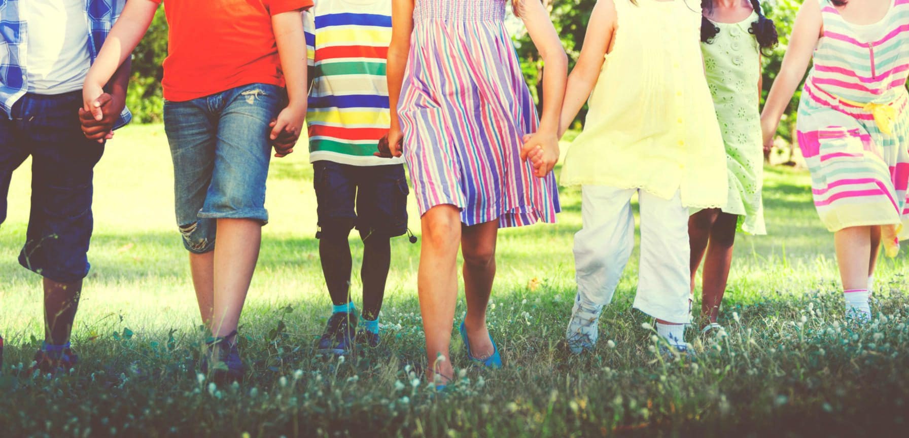 Blog 6 Diverse Children Friendship walking and holding hands
