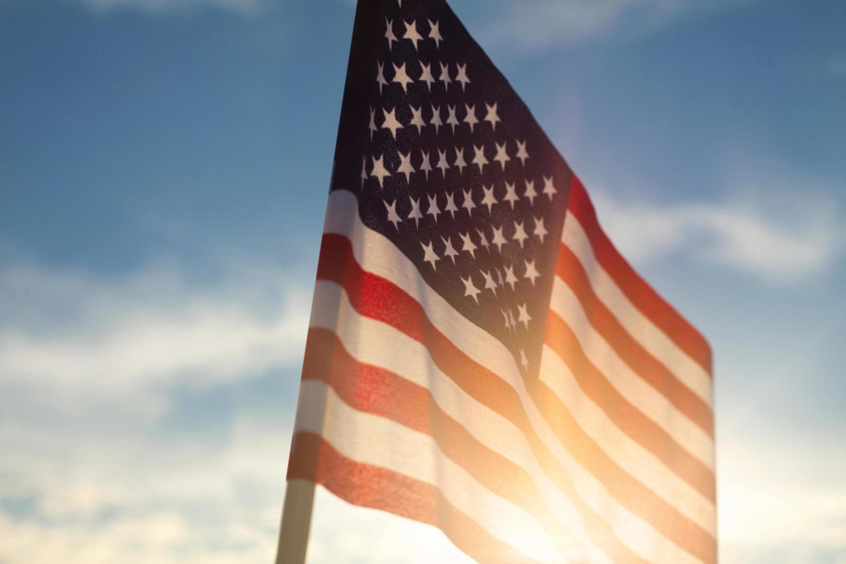 Thomas J. Henry Now Investigating 9/11 JASTA Claims 1 American Flag Against Blue Sky