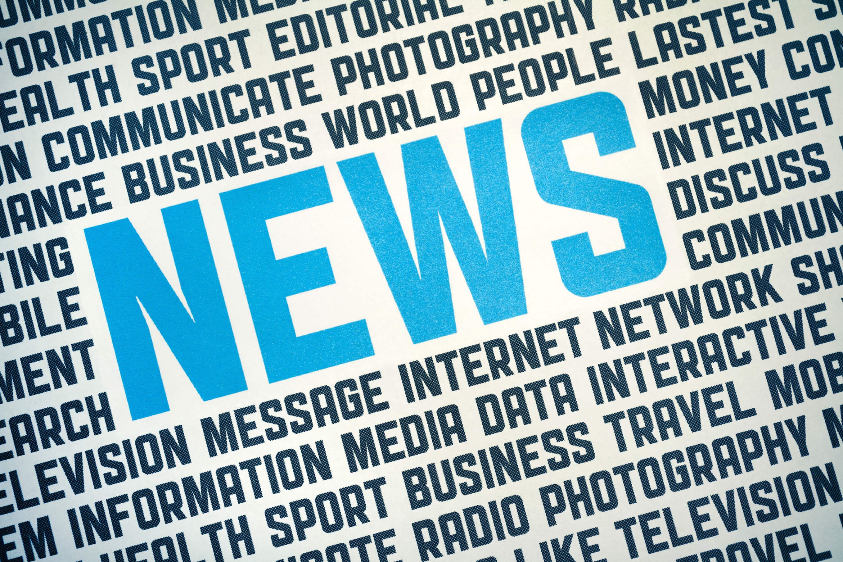 news poster sign with popular news story tags