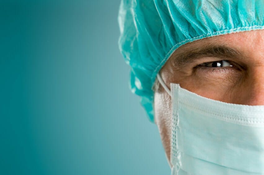 Rear-End Collisions in Texas: Who's Really at Fault? 17 male surgeon gazing and looking at camera at hospital