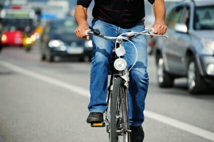 Bicyclist Sustains Severe Head Injuries in Hit-and-Run Crash 1 Man riding on bicycle