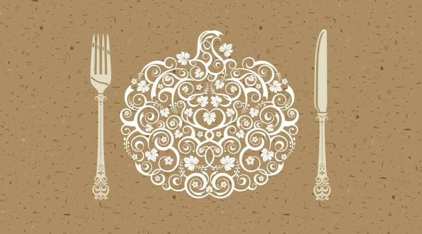Decorative pumpkin art with fork and knift