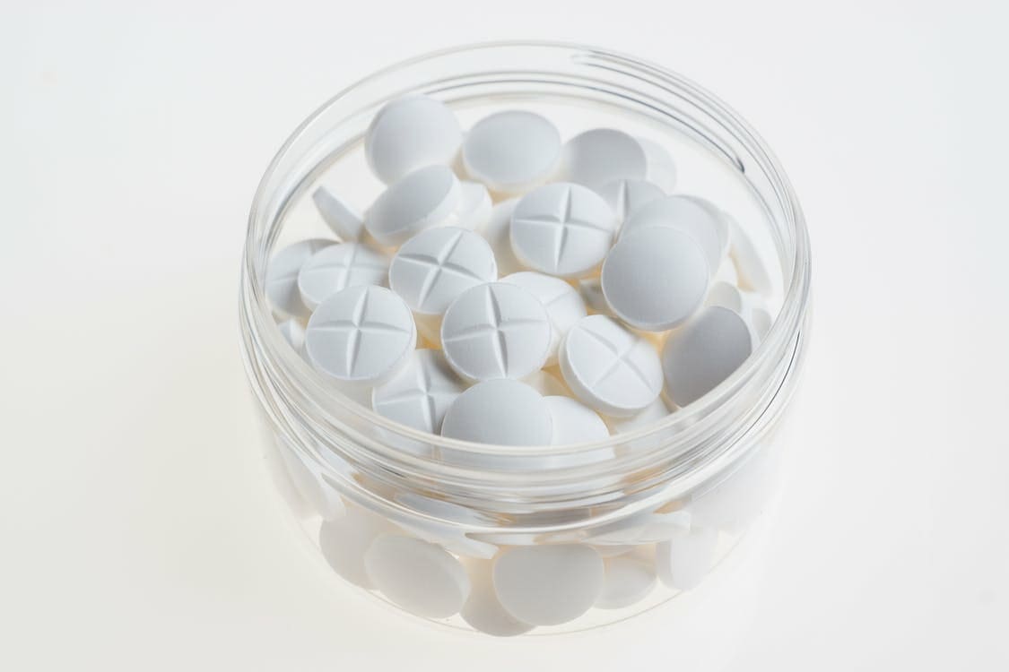 Rear-End Collisions in Texas: Who's Really at Fault? 6 White tablets in glass container