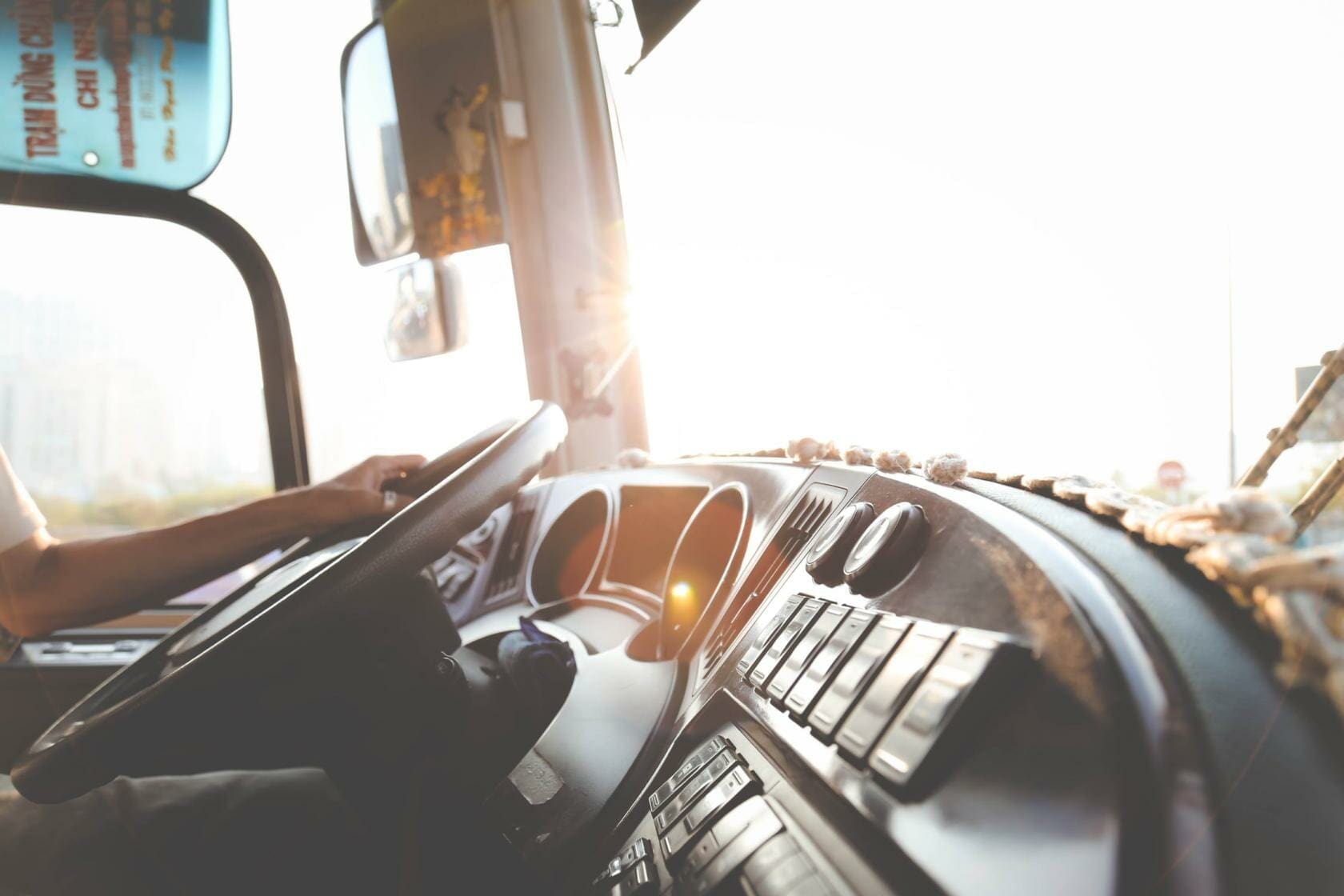 Pittsburgh Bus Driver Put on Probation After Fatal Accident 1 Public transit bus dashboard with driver's and holding the steering wheel