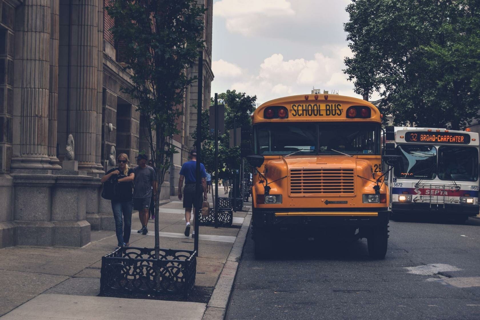 5-Year-Old Girl Struck by a School Bus Driver 1 School bus parked on side of street near sidewalk