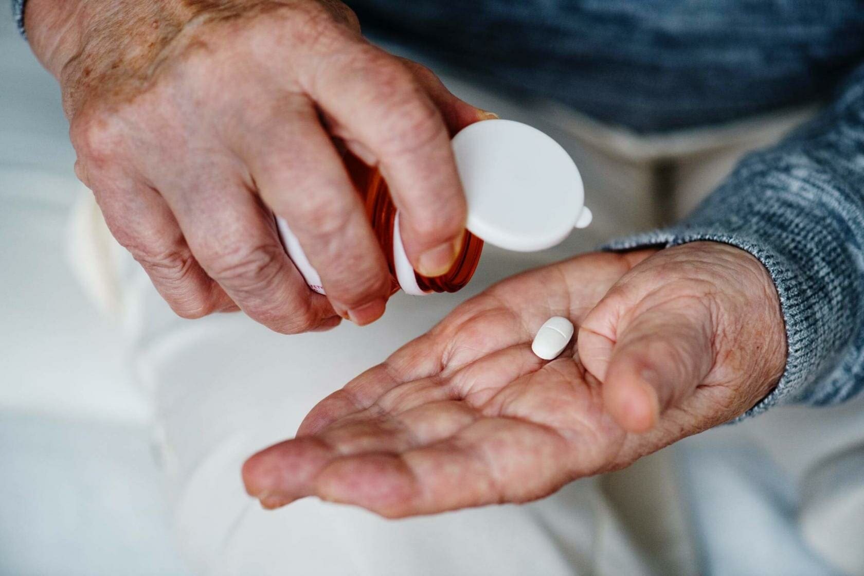 Rear-End Collisions in Texas: Who's Really at Fault? 4 Elderly man taking medication