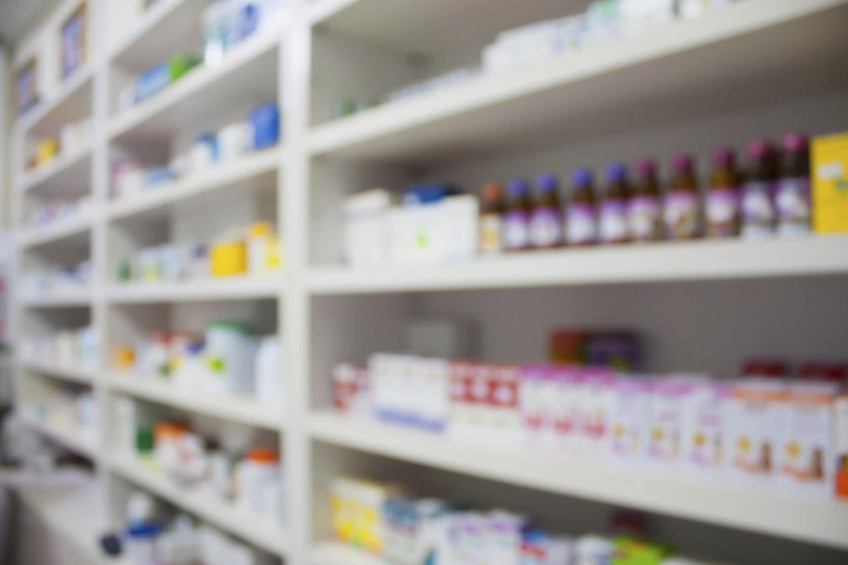 Mass Tort pharmacy store drugs shelves interior blurred background 000084686393 Large scaled