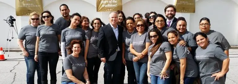 Associate Positions thomas j henry and staff prepare for 2014 turkey giveaway e1709726238288